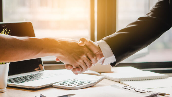 Partners,Corporate,Relationship,Concept.,Close,Up,Handshake,Of,Business,People